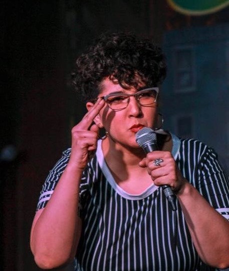 Image of Alyssa Al-Dookhi during their standup comedy set